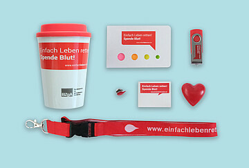 Verschiedene Give-Aways der Kampagne "Einfach Leben retten! Spende Blut"